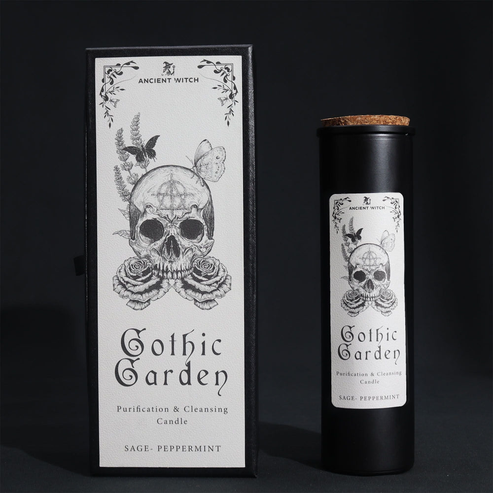Gothic Garden candle packaging with skull and floral design on a black background
