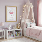 Framed artwork of a girl in a pink dress with 'Emily' and text on a light purple wall.