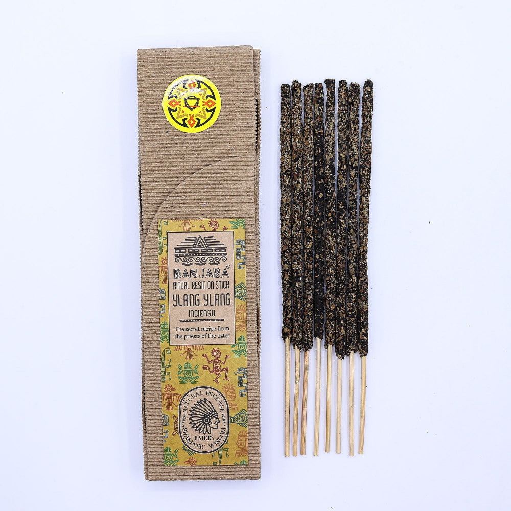 Incense sticks with their packaging on a white background
