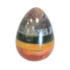 Multicolored striped egg-shaped object on a white background