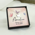 Butterfly necklace in a personalized jewelry box with 'Amelia' and 'Flower Girl' text.