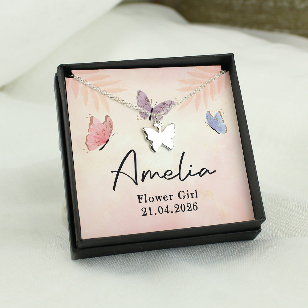 Butterfly necklace in a personalized jewelry box with 'Amelia' and 'Flower Girl' text.