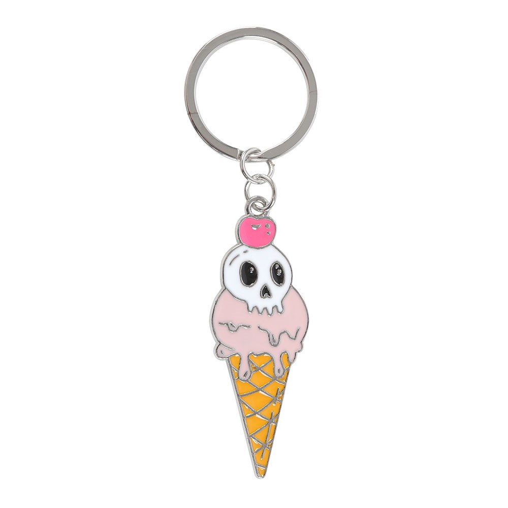 Keychain with a skull design on an ice cream cone against a white background