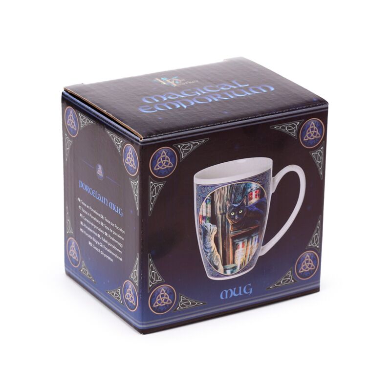 Mug in a decorative box with intricate designs and text.