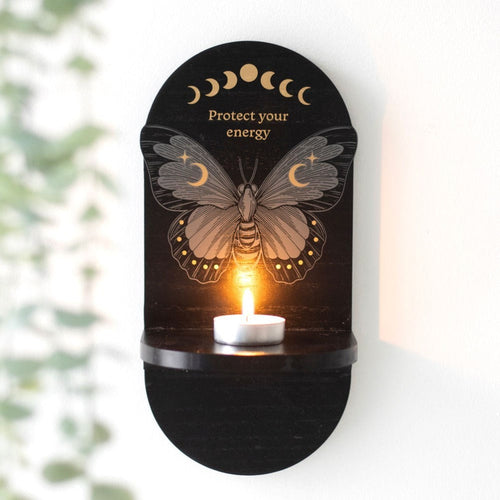 Small altar shelf with black moth