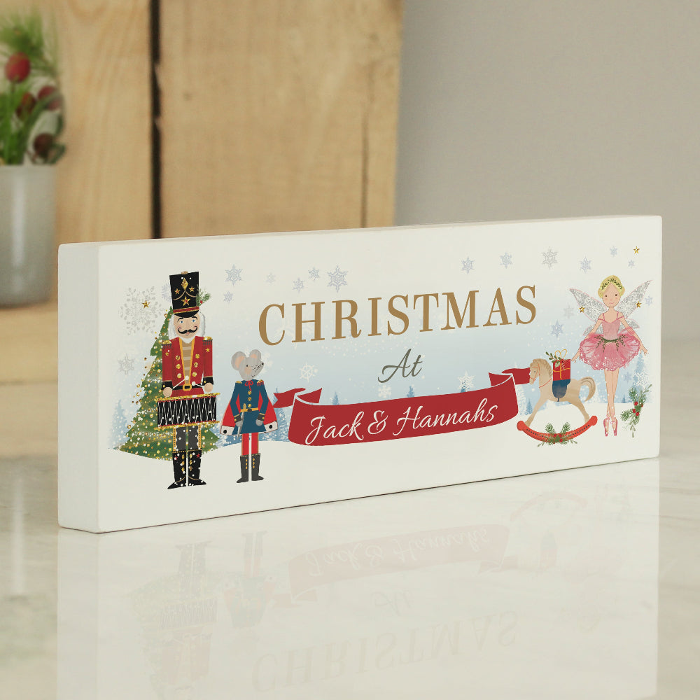 Decorative Christmas sign with illustrations and text on a white background
