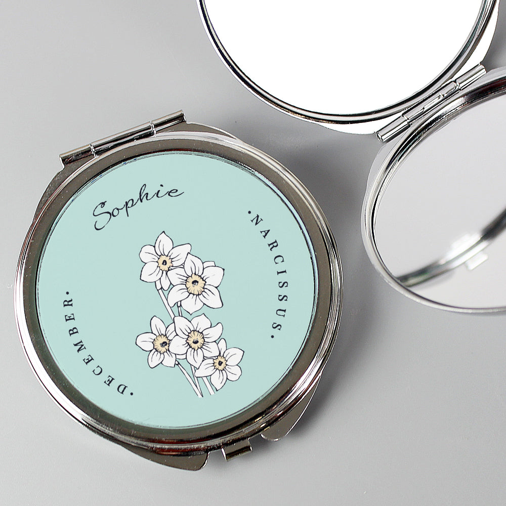 Compact mirror with floral design and 'Sophie' on a light blue background