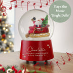 Christmas snow globe with Santa Claus in a sleigh, surrounded by musical notes and a Christmas tree.