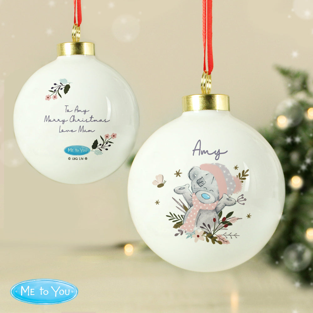 Two Christmas ornaments with a bear design and text, featuring the 'Me to You' brand.