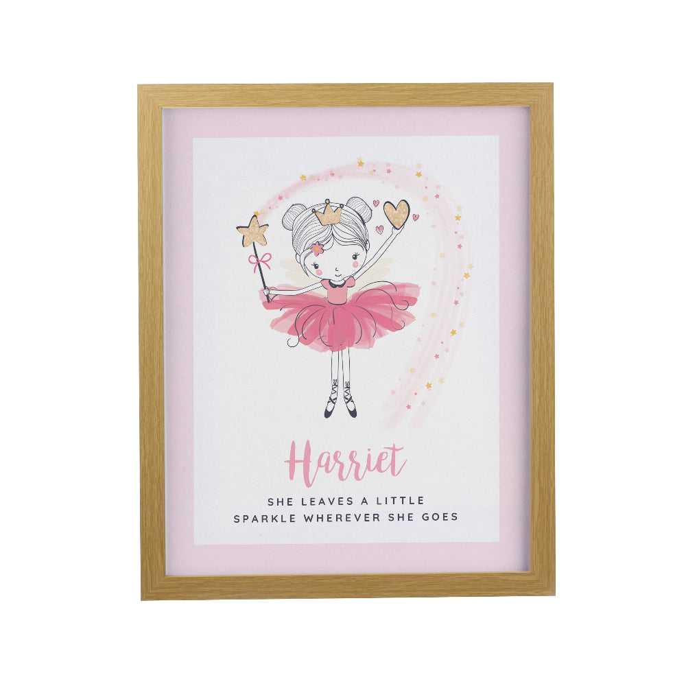 Framed artwork of a girl in a pink dress with a wand and heart, on a light pink background.