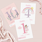 Three milestone cards for Hattie with numbers and birthday-themed designs on a light pink background.