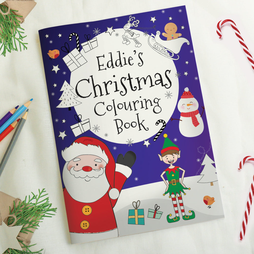 Christmas colouring book with Santa Claus and elf on a purple background, surrounded by Christmas-themed items.