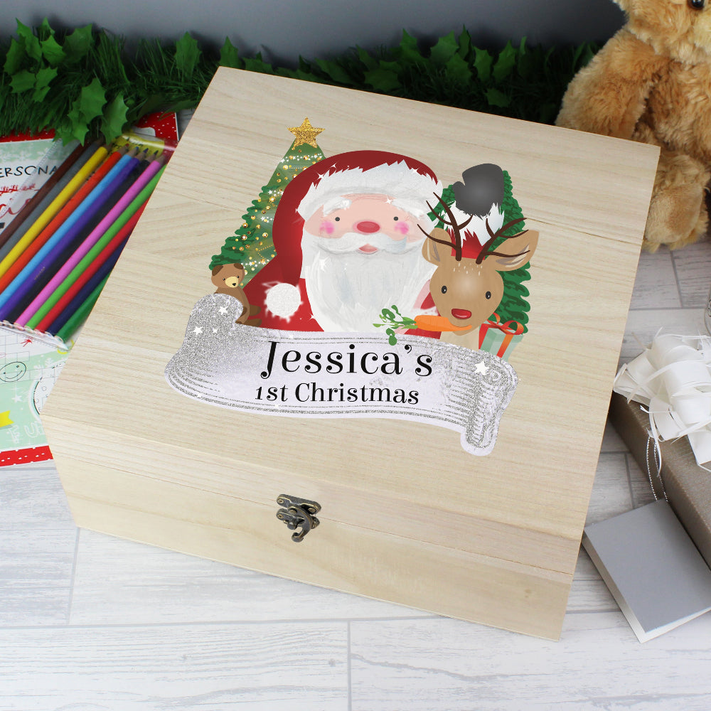 Wooden box with Santa Claus and reindeer illustration and 'Jessica's 1st Christmas' text.