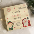 Wooden Christmas Eve box with Santa and elf design, featuring 'Polar Express' text.