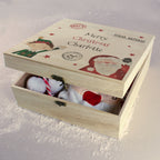 Wooden Christmas box with Santa Claus design and text 'Merry Christmas Charlotte' on a light background.
