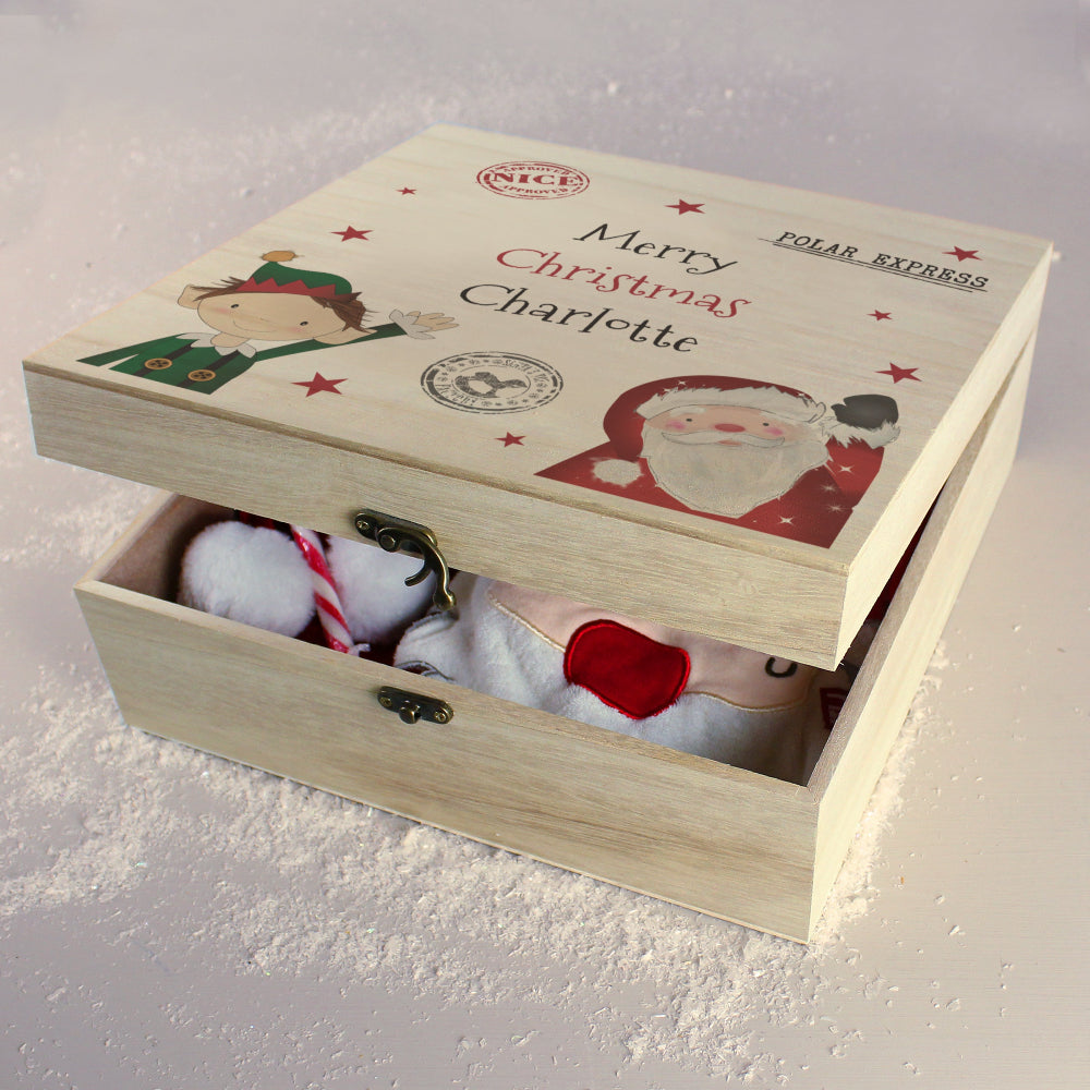 Wooden Christmas box with Santa Claus design and text 'Merry Christmas Charlotte' on a light background.