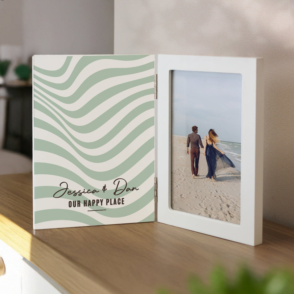Personalized photo album with wavy design and couple on beach