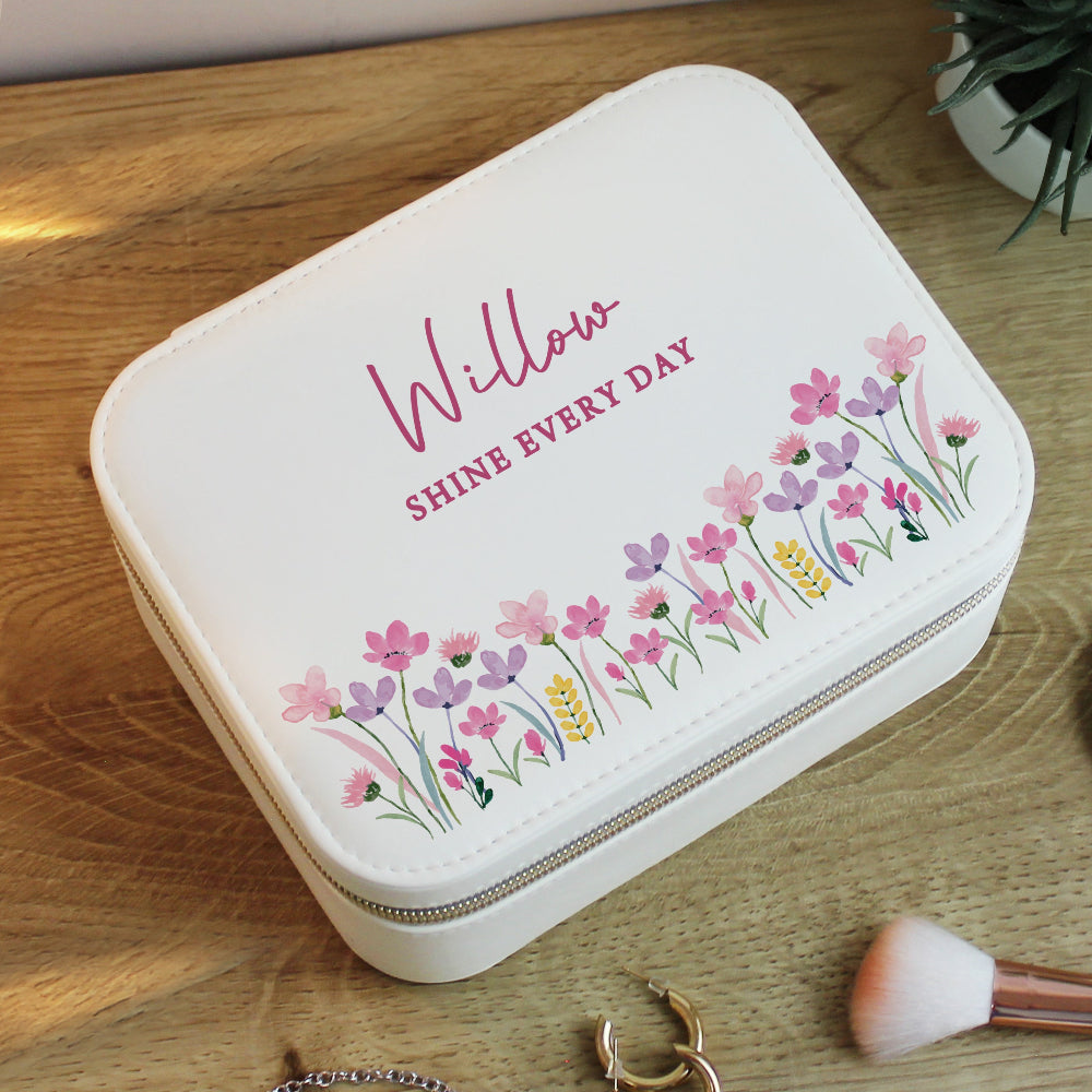 White jewelry box with floral design and 'Willow Shine Every Day' text on a wooden surface.