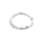 White beaded bracelet on a white background