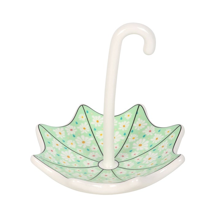 Decorative umbrella stand with floral pattern on a white background