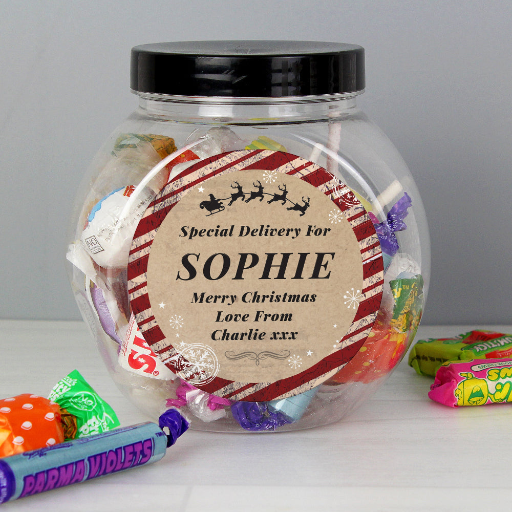 Jar of sweets with a personalized label on a gray background
