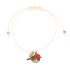 Bracelet with a bird charm on a white background