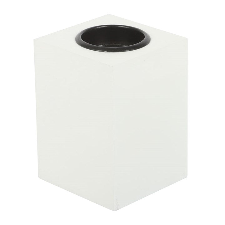 White hexagonal candle holder on a white background