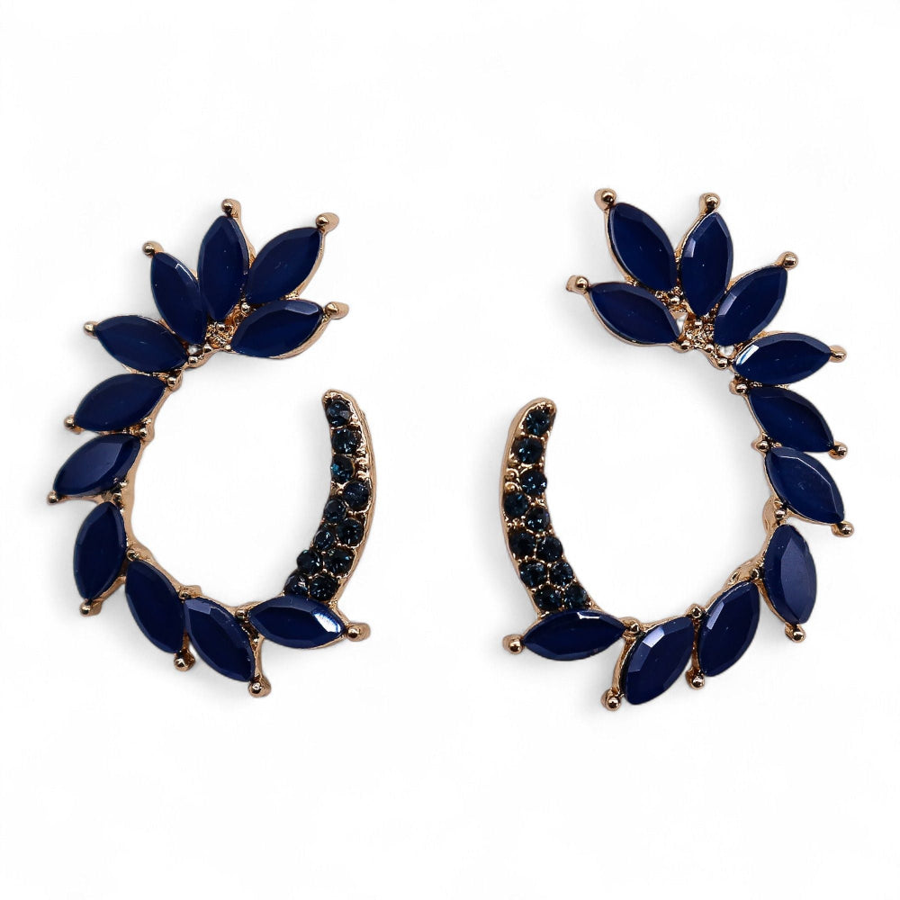 Pair of blue floral earrings with gold accents on a white background