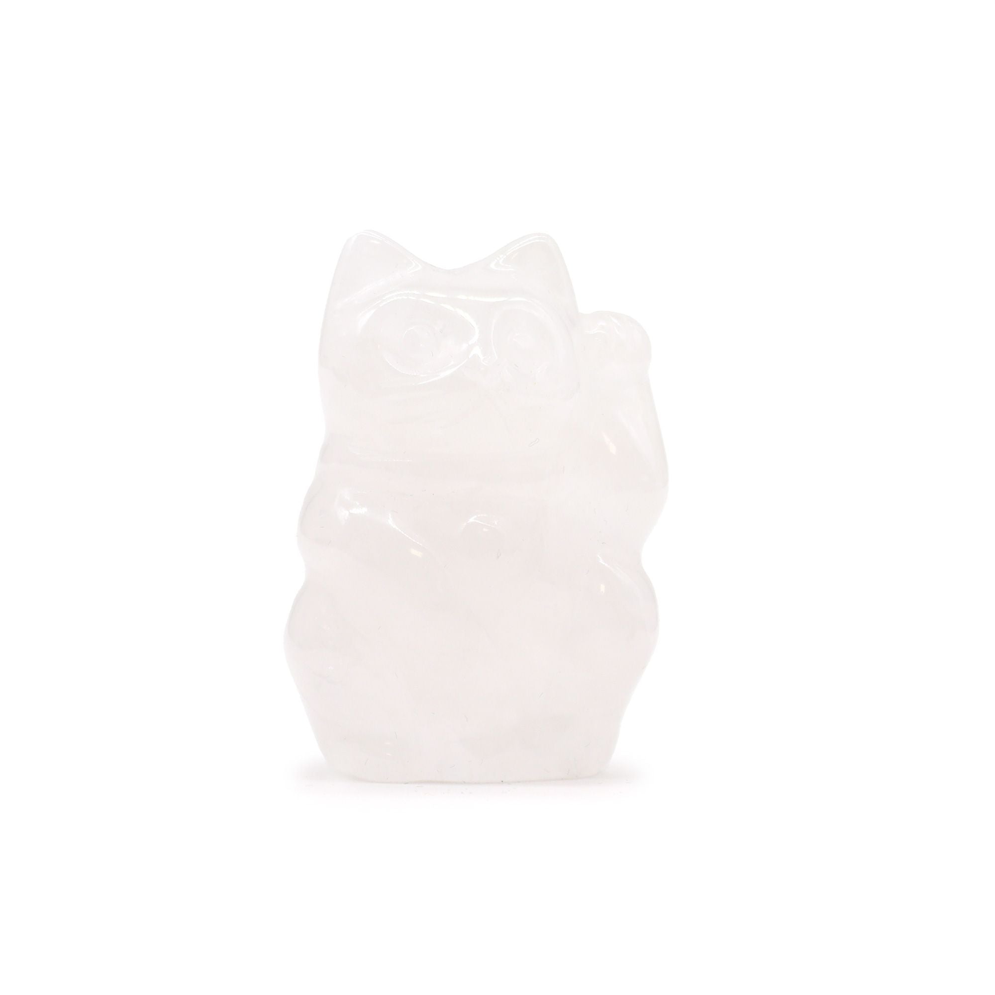 White ceramic bear-shaped object on a white background