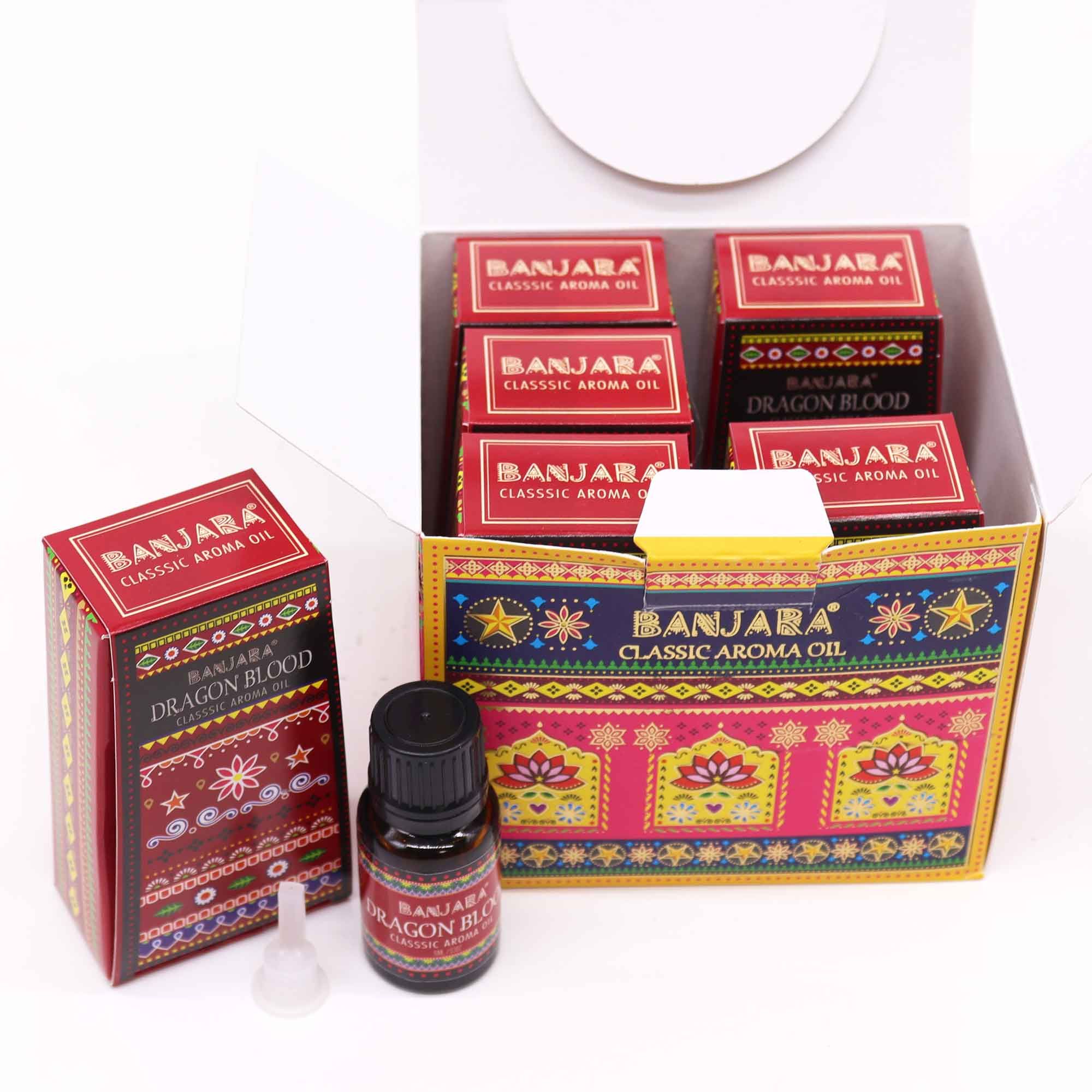 Banjara Classic Aroma Oil packaging with a bottle of Dragon Blood oil on a white background