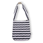 Black and white striped bag on a white background