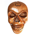 Wooden skull mask on a white background