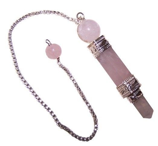 Crystal wand with pink beads on a white background