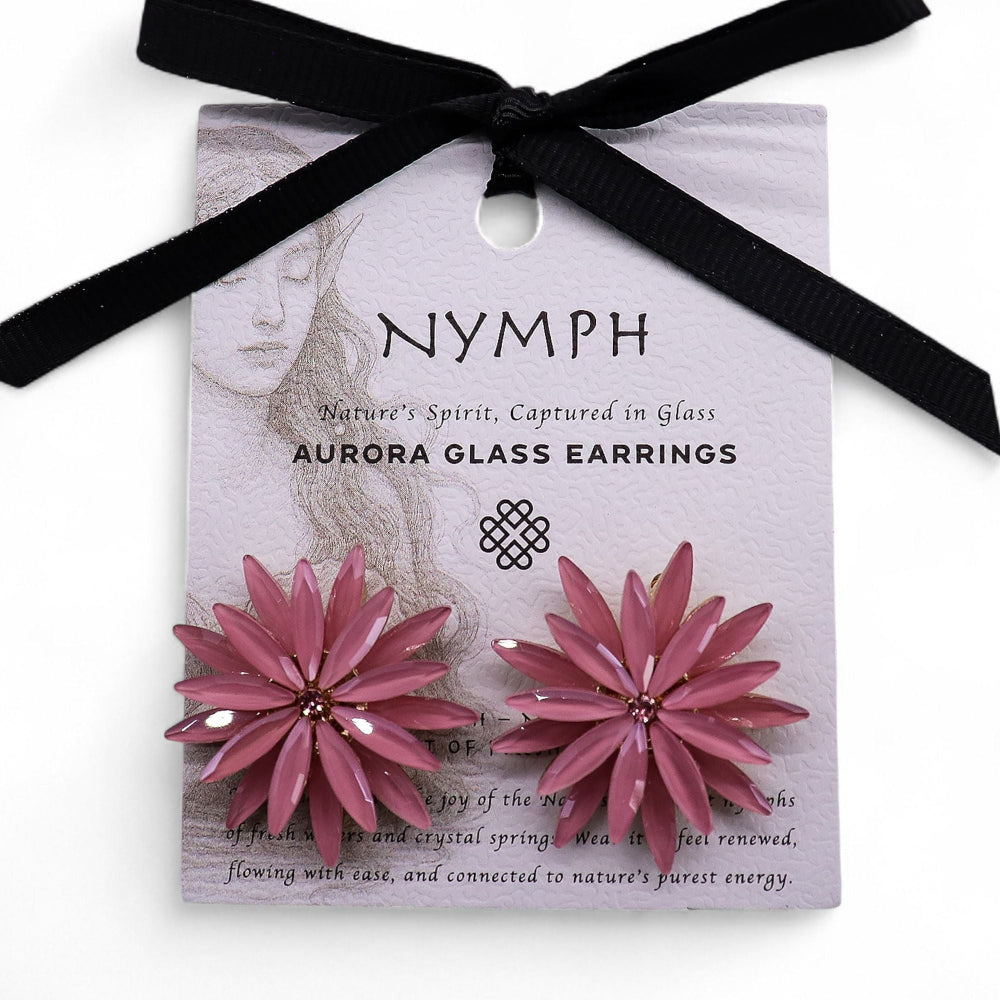 Pink flower earrings on a 'Nymph' branded card with a black ribbon.