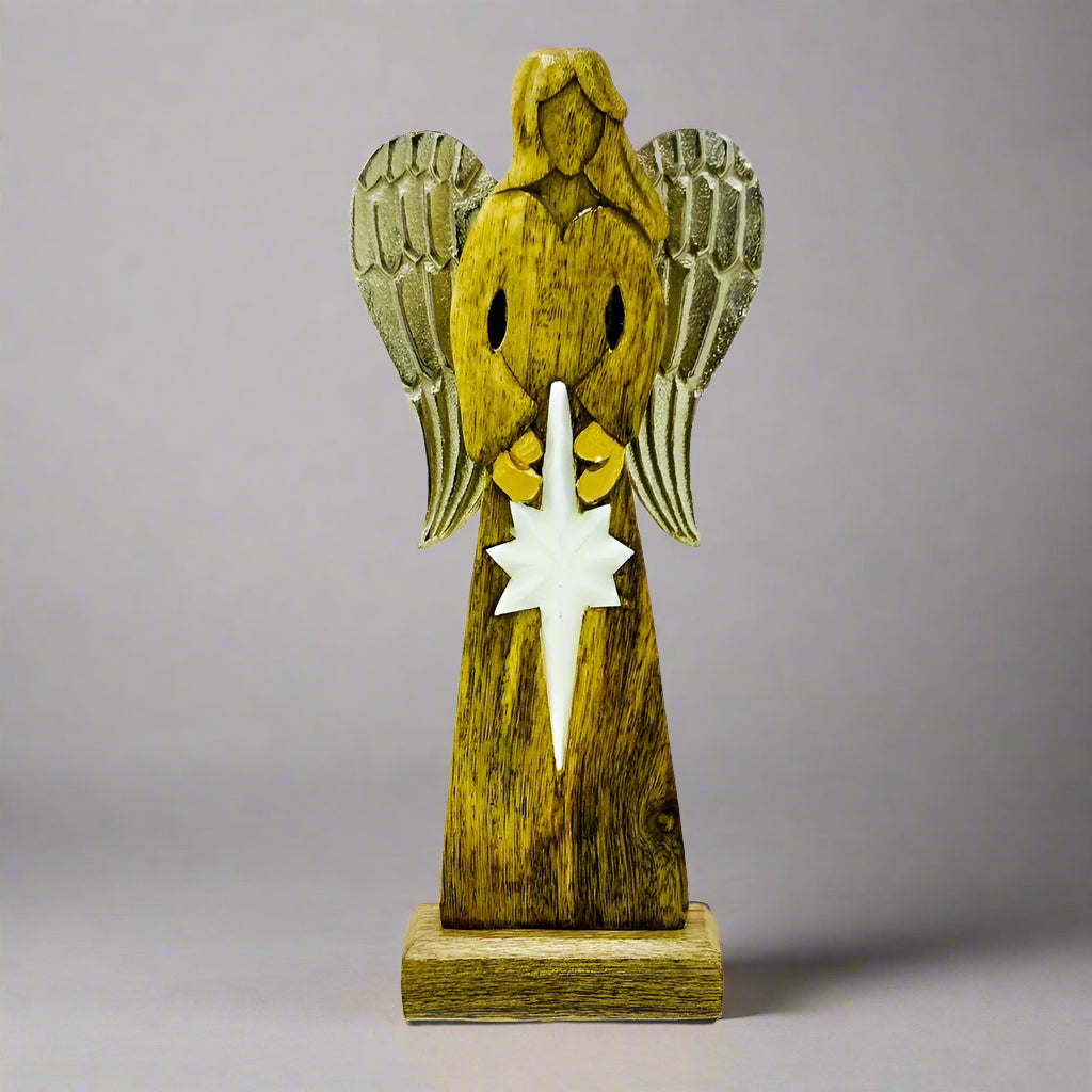 Wooden angel figurine with a star on a white background