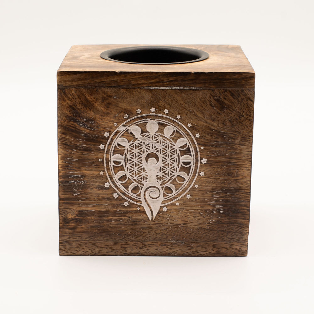 Wooden box with an engraved design on a white background