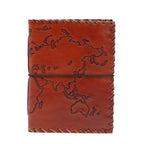 Brown leather notebook with world map embossing on a white background