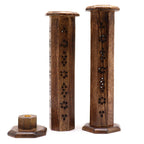 Two wooden incense burners with a smaller candle holder on a white background
