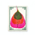 Card with a green and pink leaf design on a white background