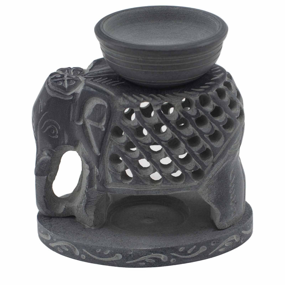 Decorative oil burner shaped like an elephant on a white background