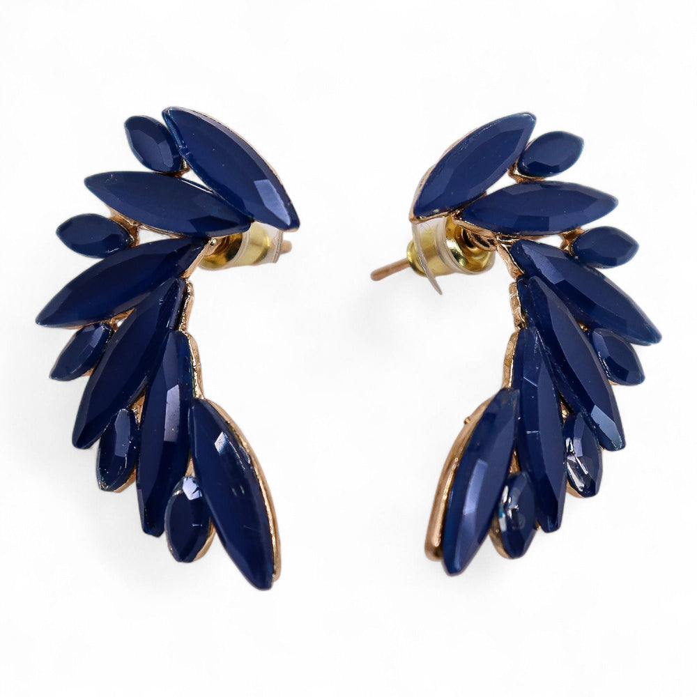 Pair of blue leaf-shaped earrings on a white background