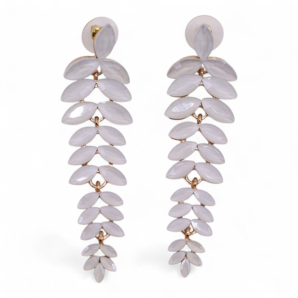 Pair of white leaf-shaped earrings on a white background