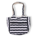 Black and white striped tote bag on a white background