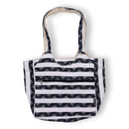 Black and white striped tote bag on a white background