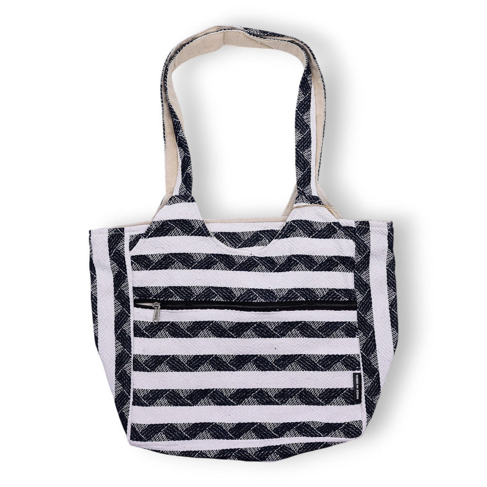 Black and white striped tote bag on a white background