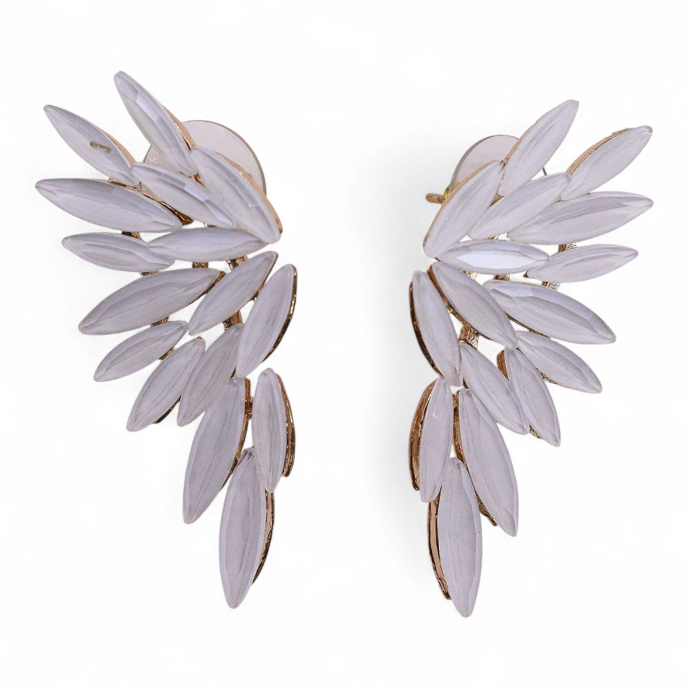 Pair of white leaf-shaped earrings on a white background