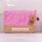Pink and natural fabric pouch with 'Pamper Pouch' label and tag on a white background