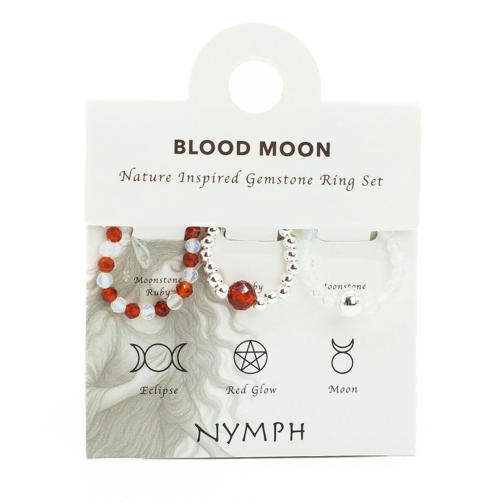 Packaging of a 'Blood Moon' nature inspired gemstone ring set with symbols and text.