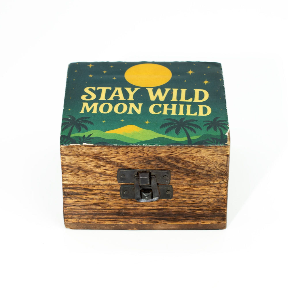 Wooden box with 'Stay Wild Moon Child' design on a white background