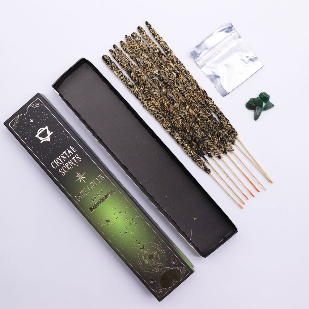 Incense sticks with packaging labeled 'Crystal Scents' on a white background